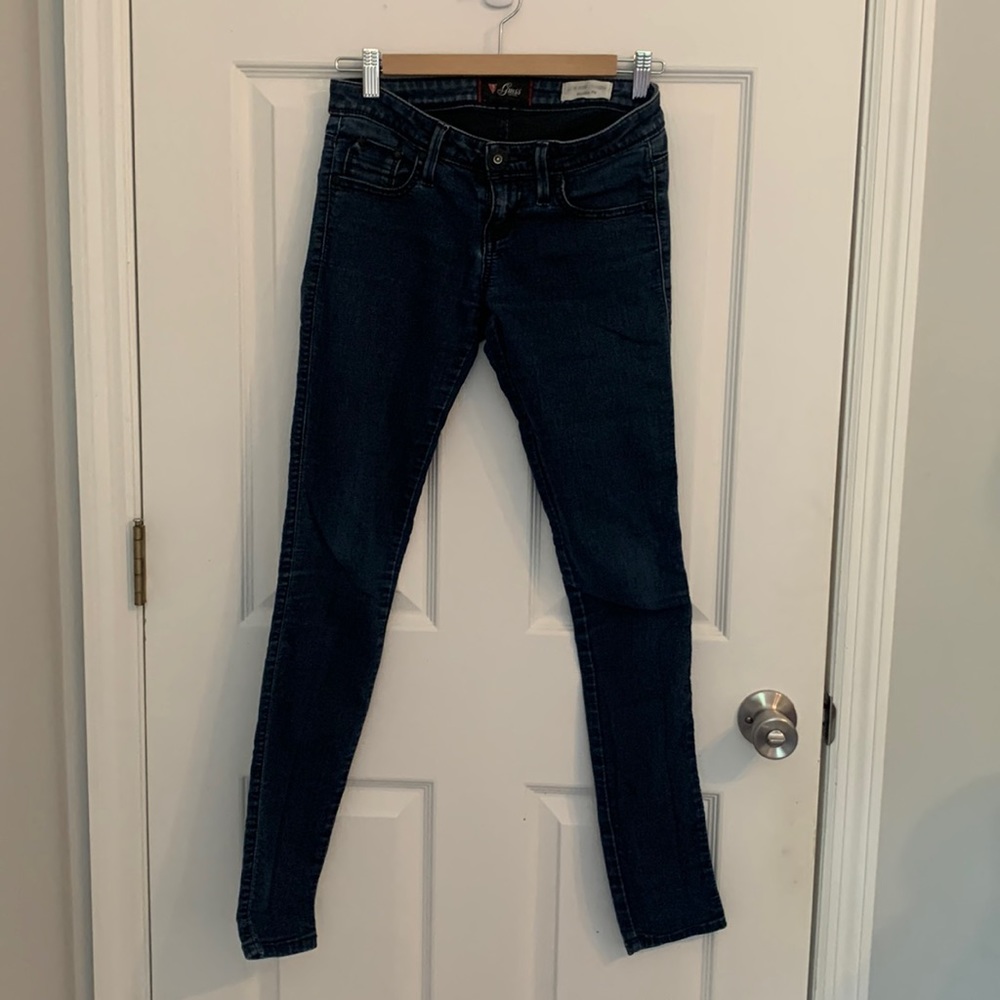 Guess Vintage size 27 jean with patch on back.